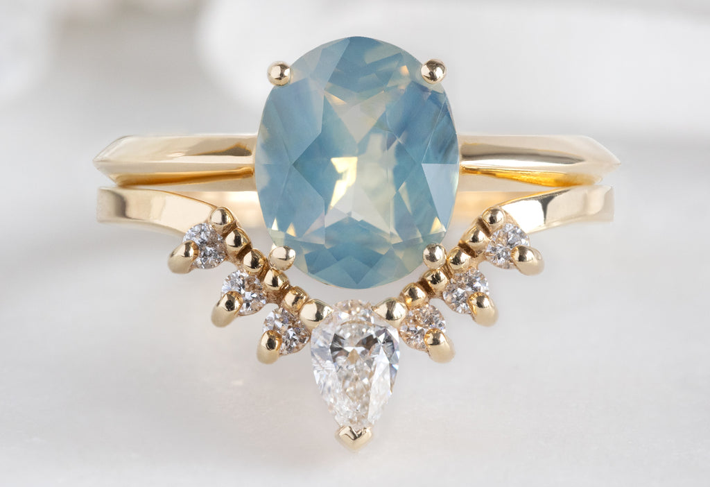 The Bryn Ring with an Oval-Cut Parti Sapphire with White Diamond Sunburst Stacking Band