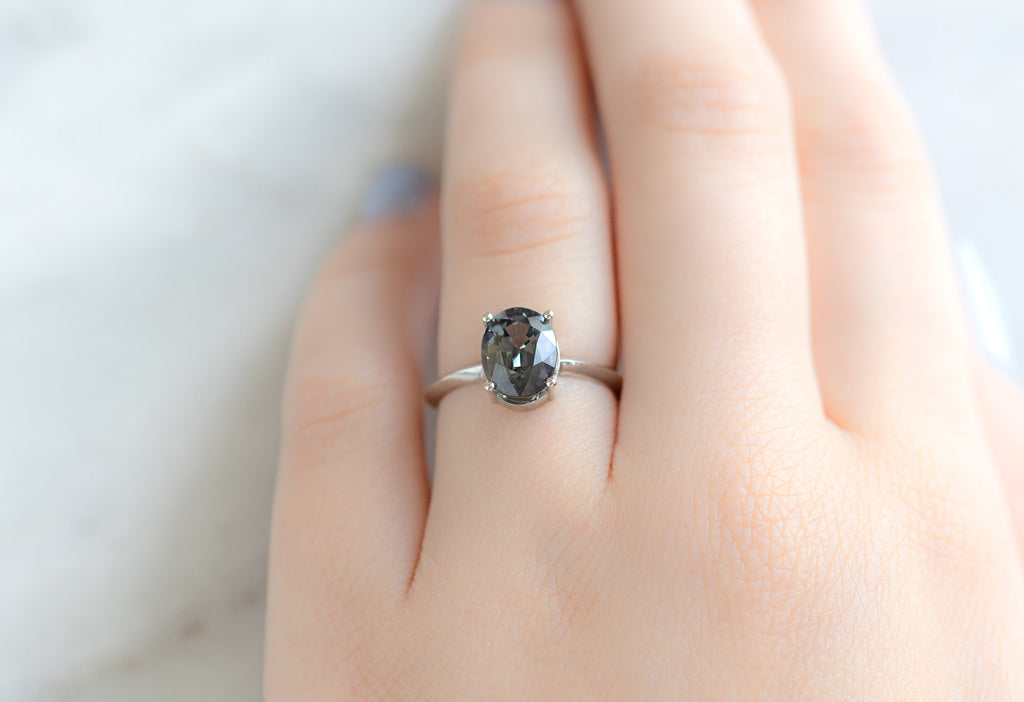 The Bryn Ring with an Oval-Cut Spinel on Model