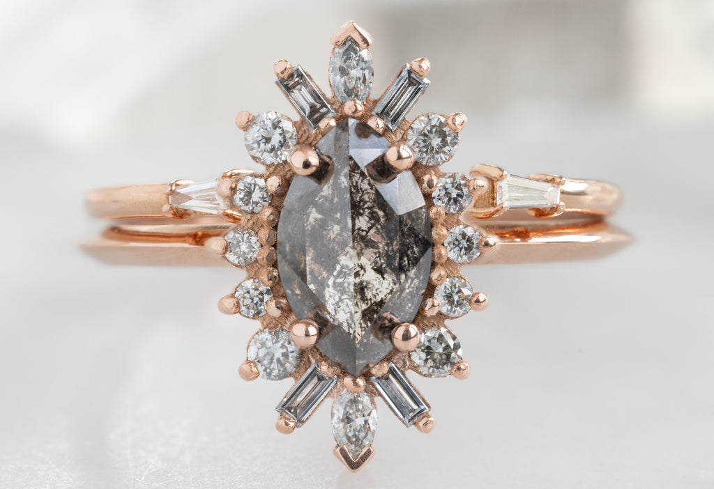 The Camellia Ring with a Black Marquise Diamond with Open Cuff Baguette Stacking Band