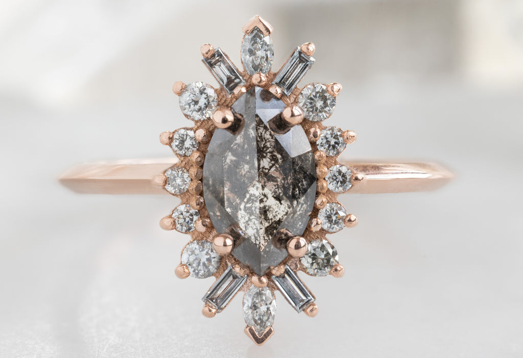The Camellia Ring with a Black Marquise Diamond