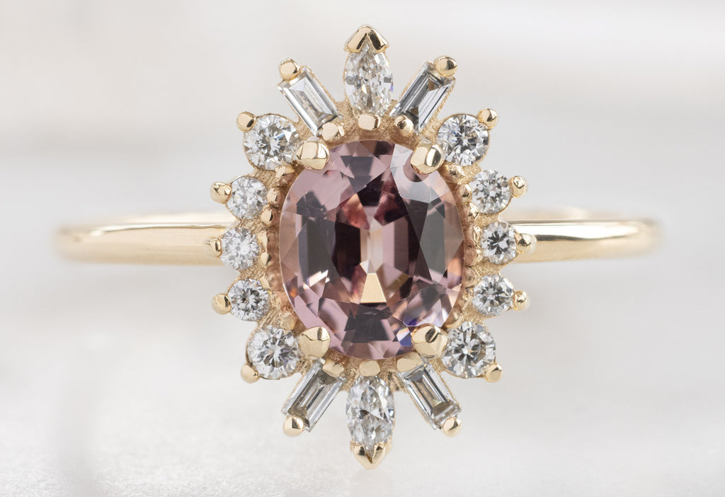 The Camellia Ring with a Sunset Spinel