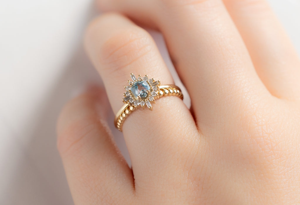 The Compass Ring with a Montana Sapphire with Beaded Stacking Band on Model