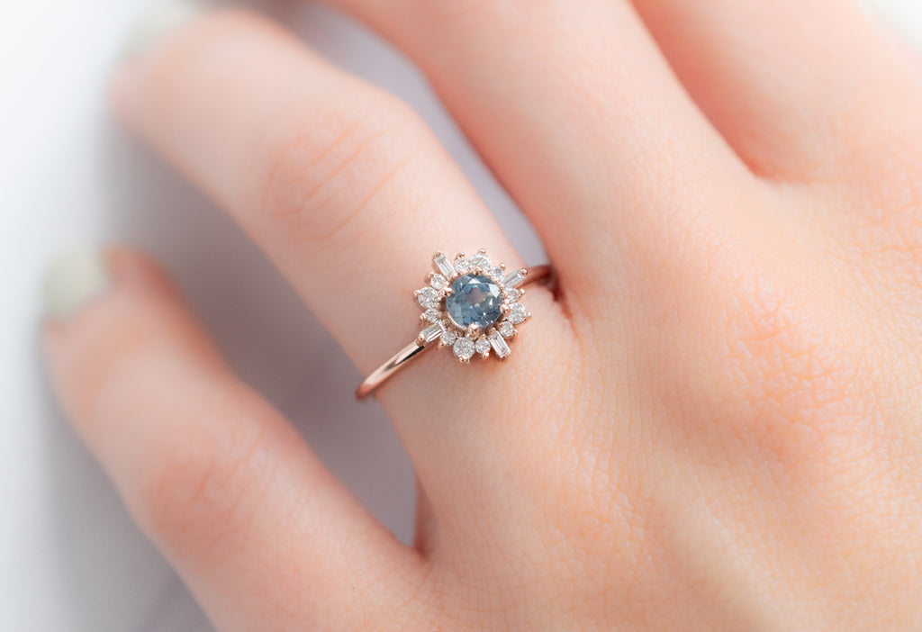 The Compass Ring with a Round Montana Sapphire on Model