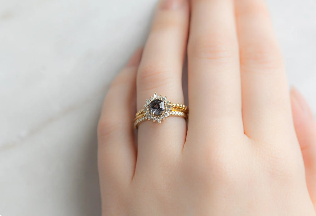 The Compass Ring with a Violet Grey Spinel with Stacking Bands on Model