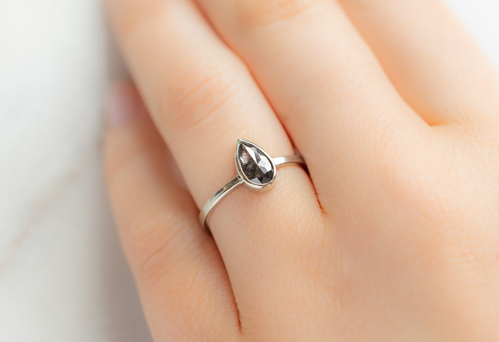 The Hazel Ring with a Rose-Cut Black Diamond on Model