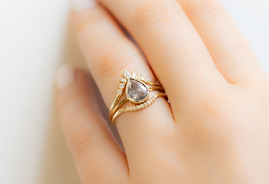 The Hazel Ring with a Rose-Cut Salt and Pepper Diamond with White Diamond Stacking Bands on Model