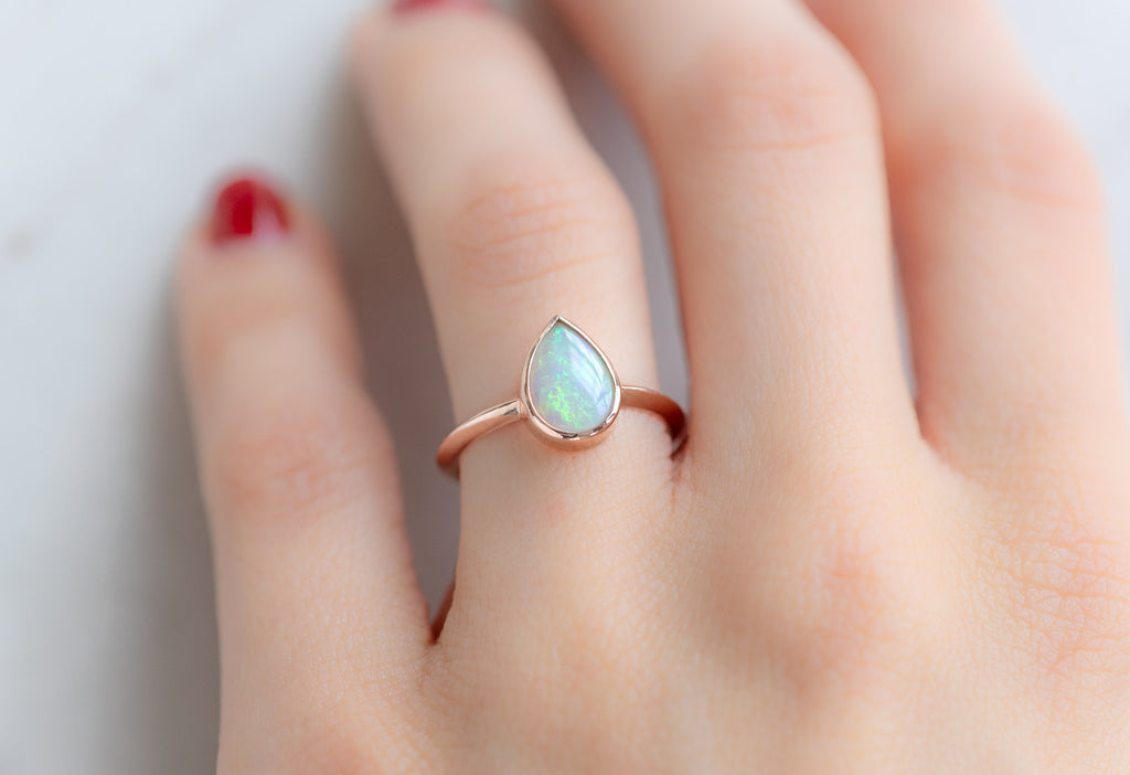 The Hazel Ring with an Australian Opal on Model
