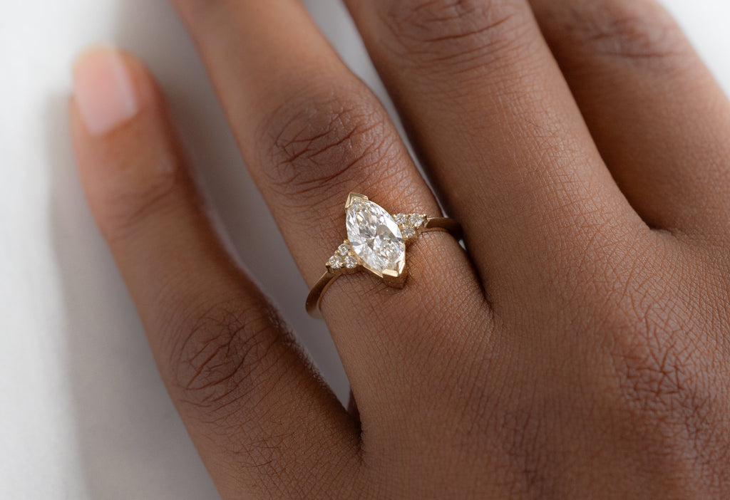 The Ivy Ring with a Lab Grown Marquise Diamond on Model