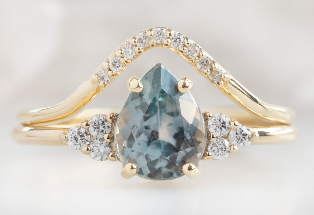The Ivy Ring with a Pear-Cut Montana Sapphire with Pavé Peak Diamond Stacking Band