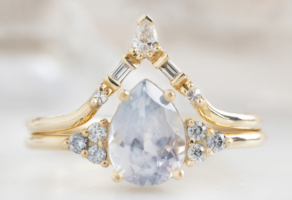 The Ivy Ring with a Pear-Cut Montana Sapphire with White Diamond Tiara Stacking Band