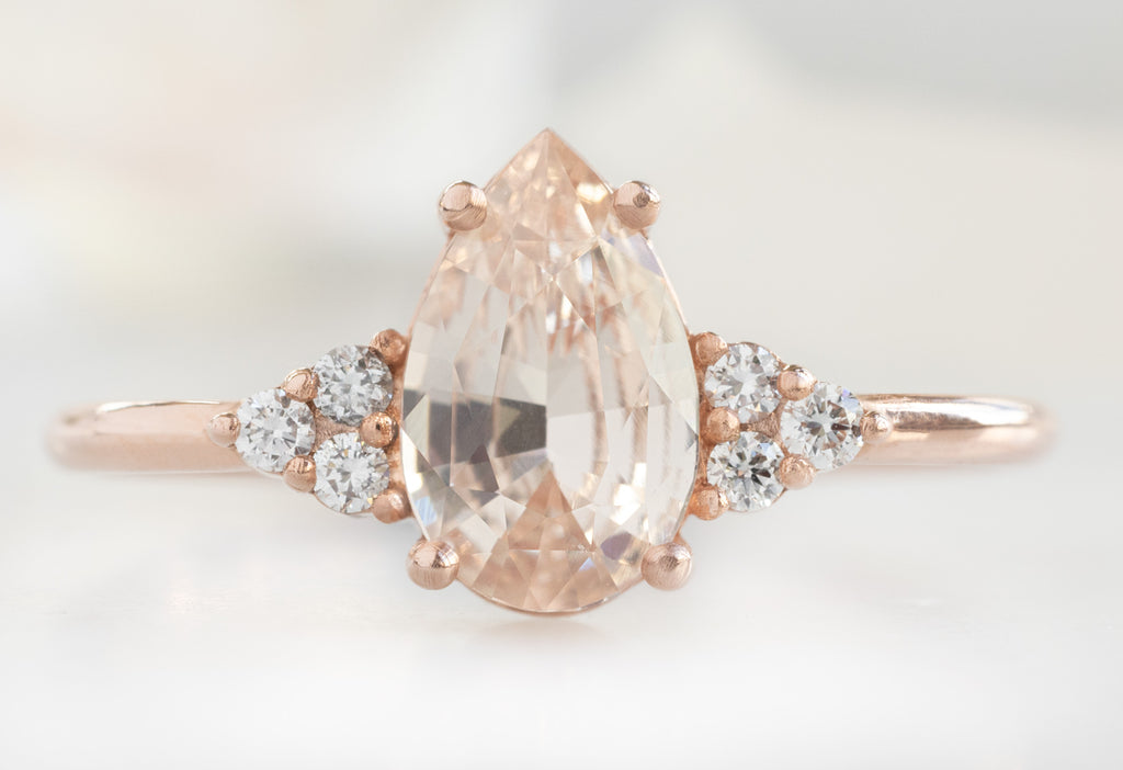 The Ivy Ring with a Pear-Cut Peach Sapphire