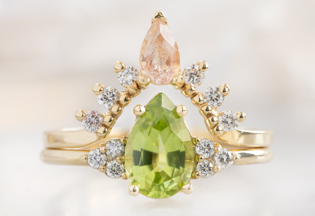 The Ivy Ring with a Pear-Cut Peridot with Sunstone and Diamond Sunburst Stacking Band