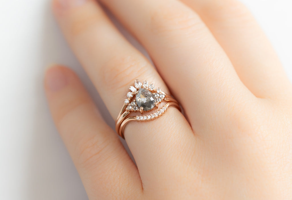 The Ivy Ring with a Rose-Cut Salt and Pepper Diamond with White Diamond Stacking Bands on Model