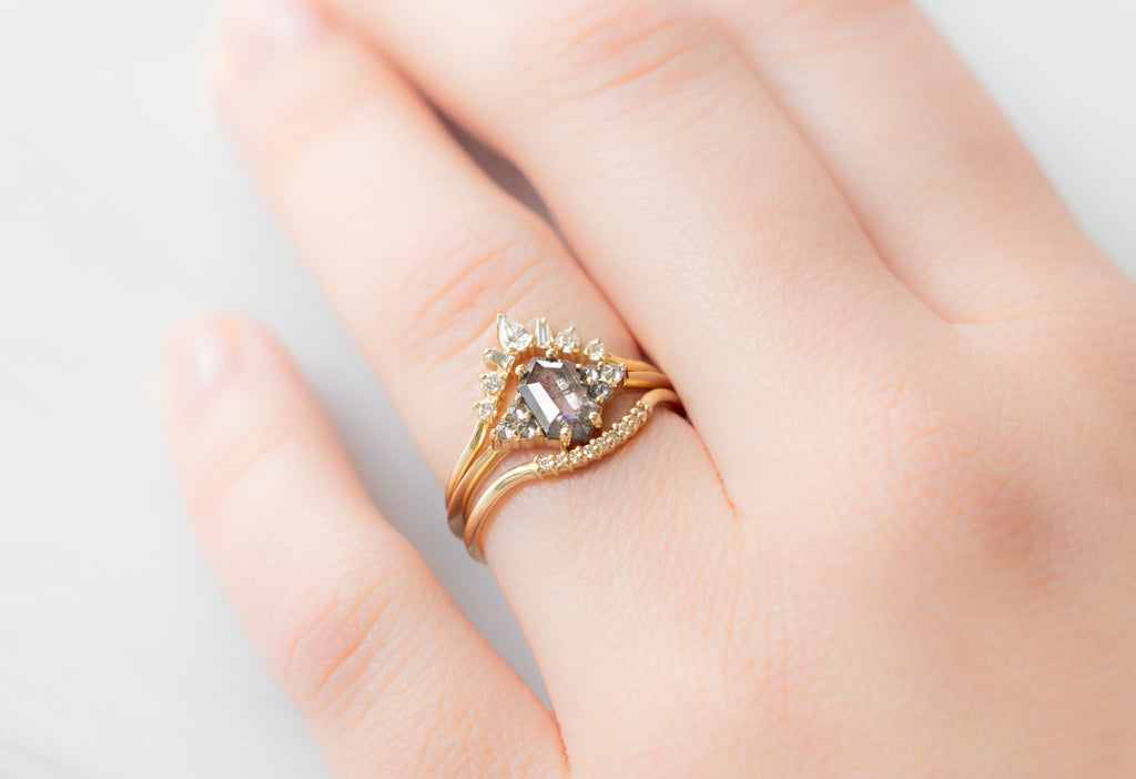 The Ivy Ring with a Salt and Pepper Hexagon Diamond with White Diamond Stacking Bands on Model