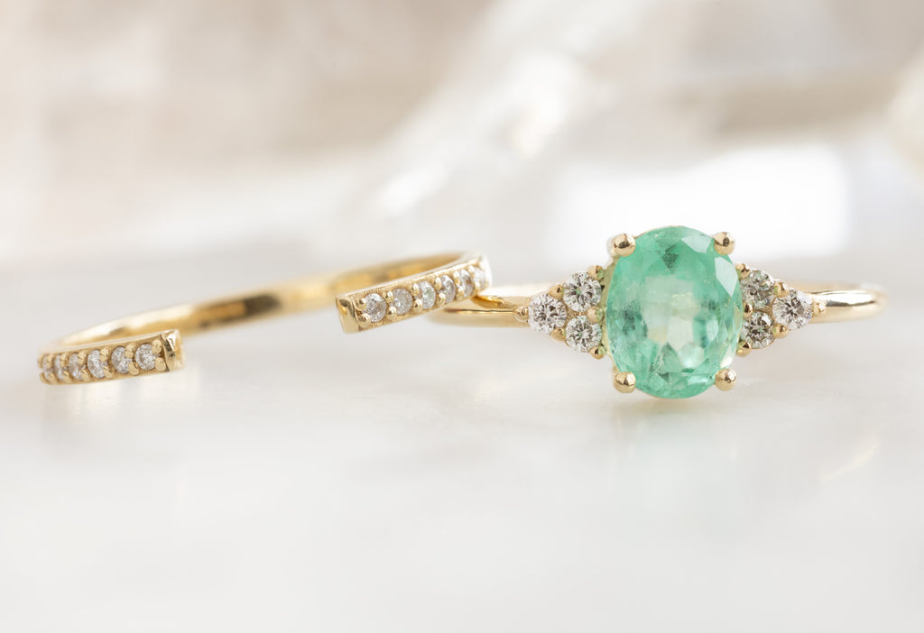 The Ivy Ring with an Oval-Cut Emerald with Open Cuff Pavé Diamond Stacking Band
