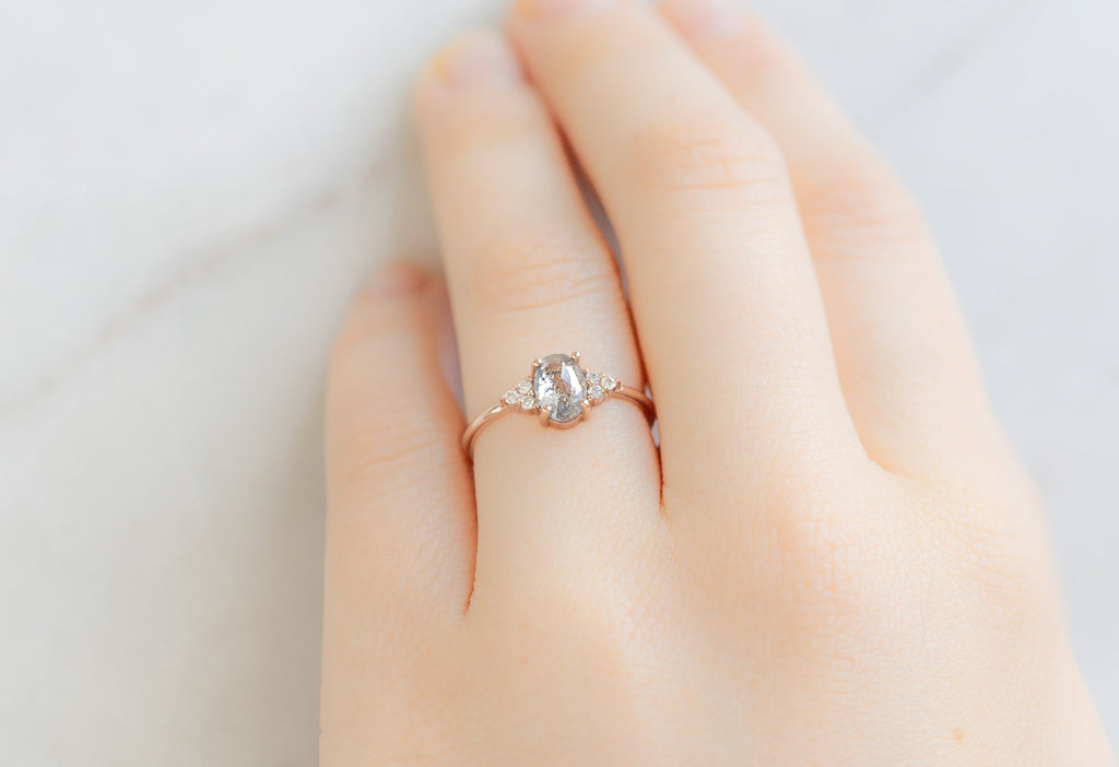 The Ivy Ring with an Oval-Cut Salt and Pepper Diamond on Model