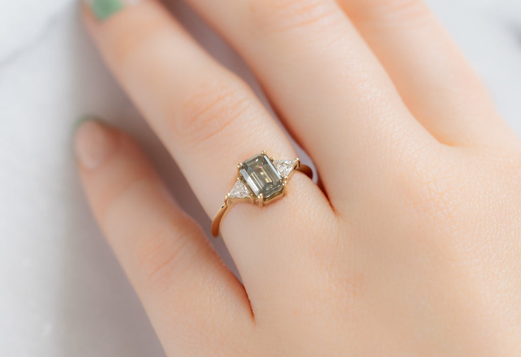 The Jade Ring with an Emerald-Cut Green Diamond on Model