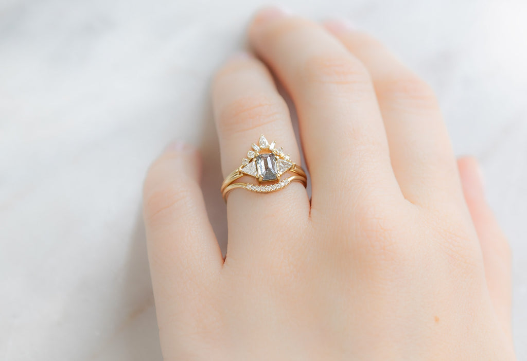 The Jade Ring with an Emerald-Cut Salt and Pepper Diamond with White Diamond Stacking Bands on Model