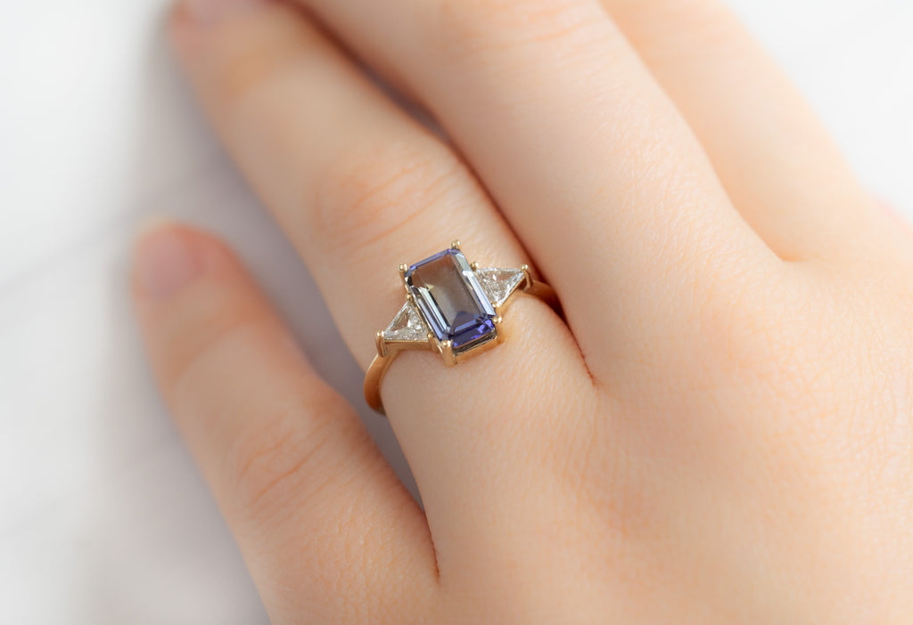 The Jade Ring with an Emerald-Cut Tanzanite on Modle
