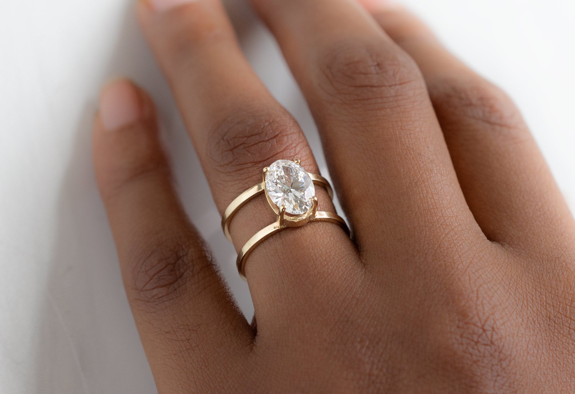 The Poppy Ring with an Oval-Cut Lab Grown Diamond on Model