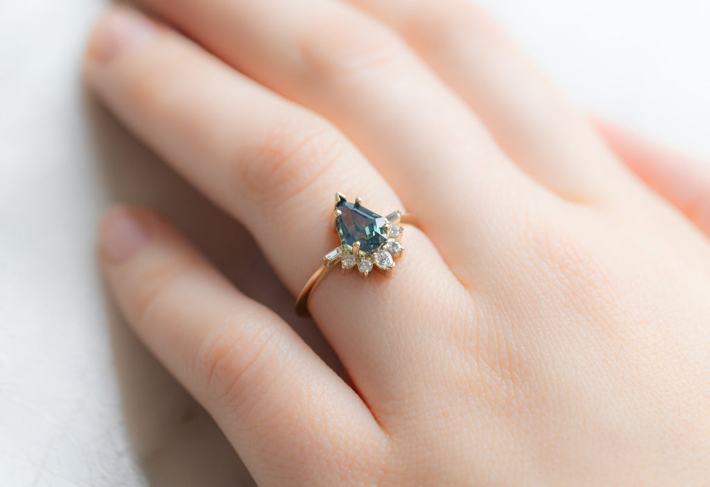 The Posy Ring with a Geometric Sapphire on Model