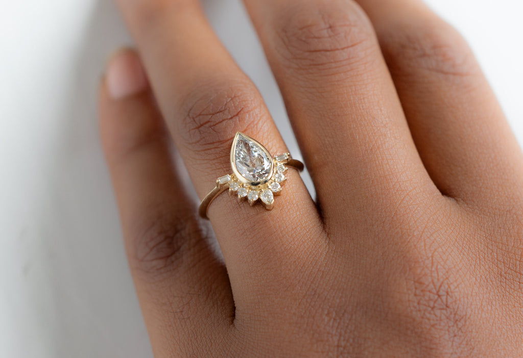 The Posy Ring with a Pear-Cut Lab Grown Diamond on Model