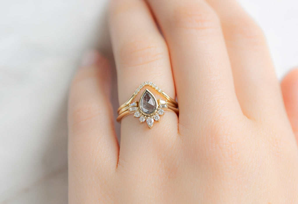 The Posy Ring with a Rose-Cut Salt and Pepper Diamond with White Diamond Stacking Bands on Model