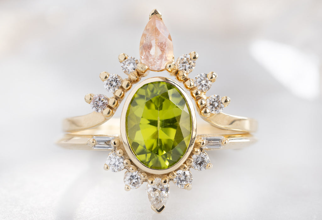 The Posy Ring with an Oval-Cut Peridot with DIamond and Sunstone Sunburst Stacking Band