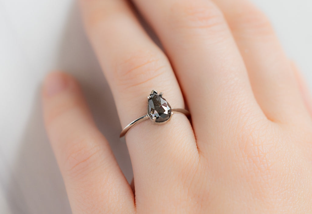 The Sage Ring with a Rose-Cut Black Diamond on Model