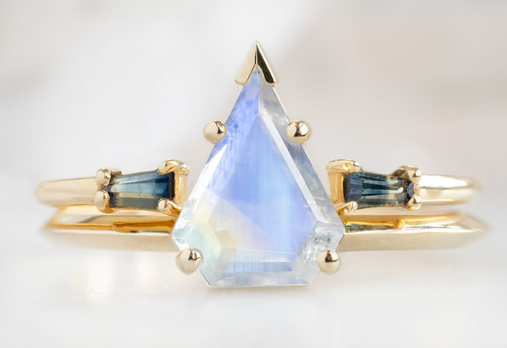 The Sage Ring with a Shield-Cut Moonstone with Open Cuff Montana Sapphire Baguette Stacking Band
