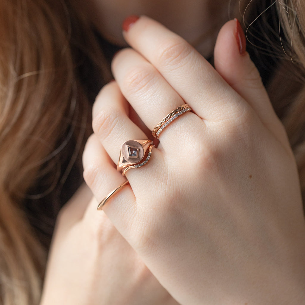 The Salt and Pepper Kite Diamond Signet Ring Stylized on Model