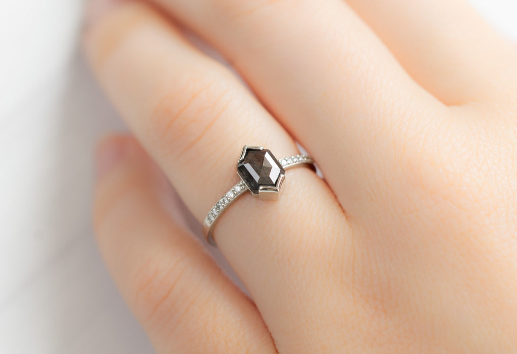 The Willow Ring with a Black Hexagon Diamond on Model