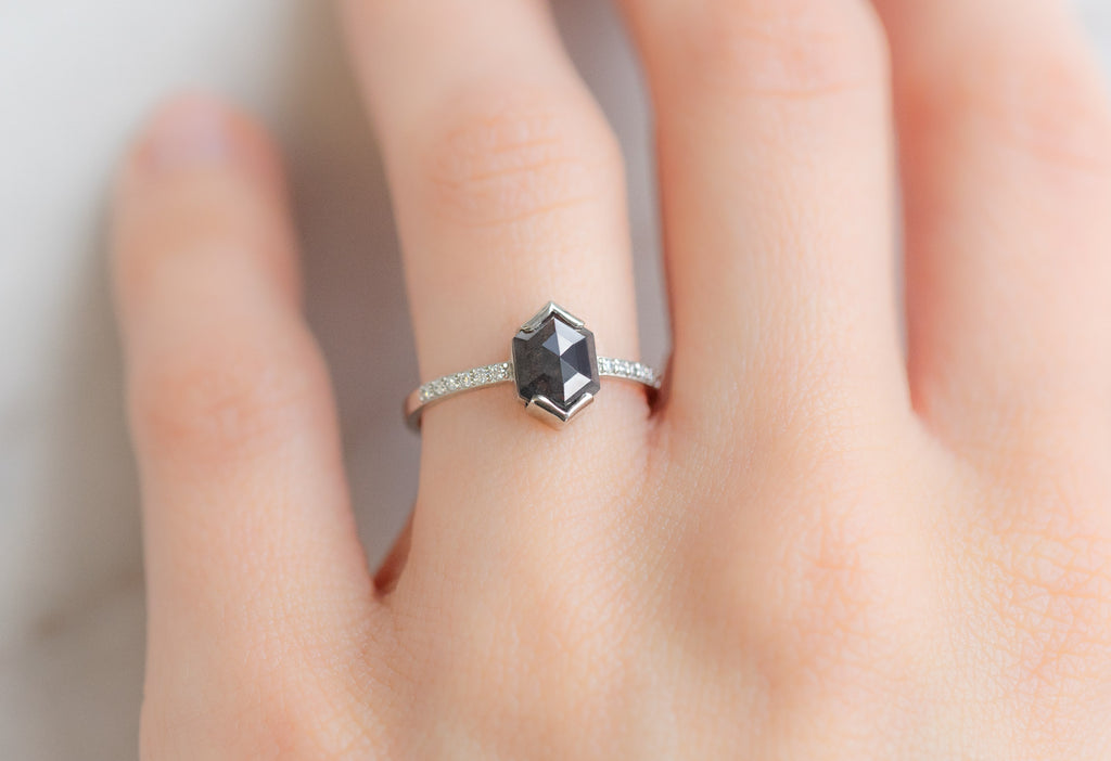 The Willow Ring with a Black Hexagon Diamond on Model
