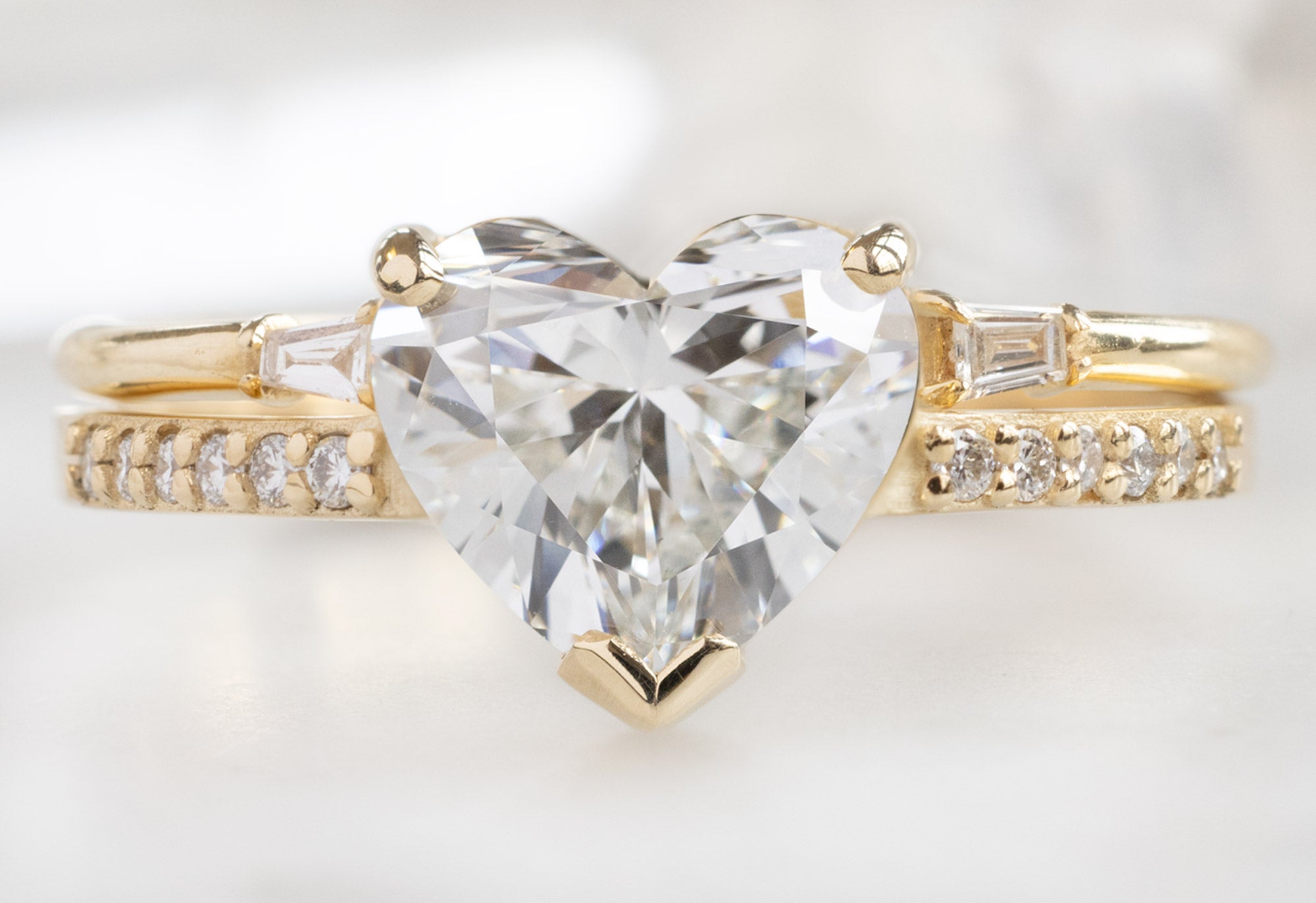 The Willow Ring with a Heart-Shaped Lab Grown Diamond with Open Cuff Baguette Stacking Band