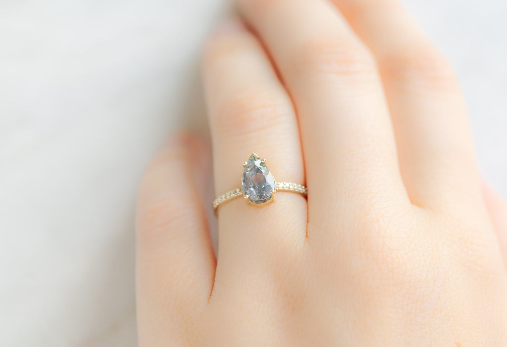 The Willow Ring with a Pear-Cut Lavender Sapphire on Model