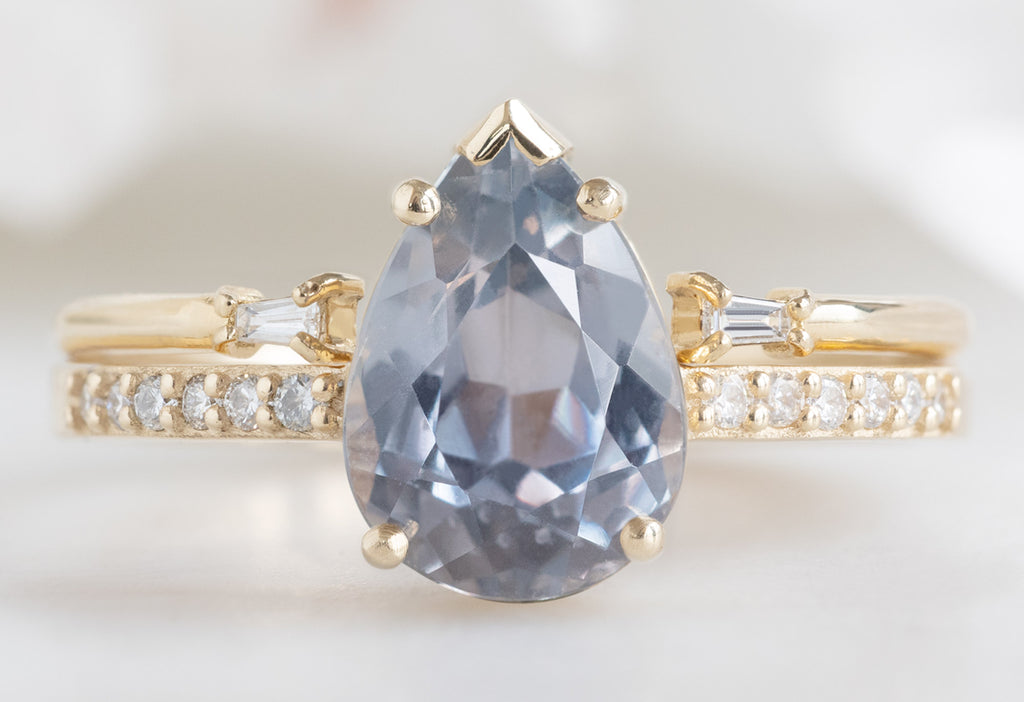 The Willow Ring with a Pear-Cut Lavender Sapphire with Open Cuff Baguette Stacking Band