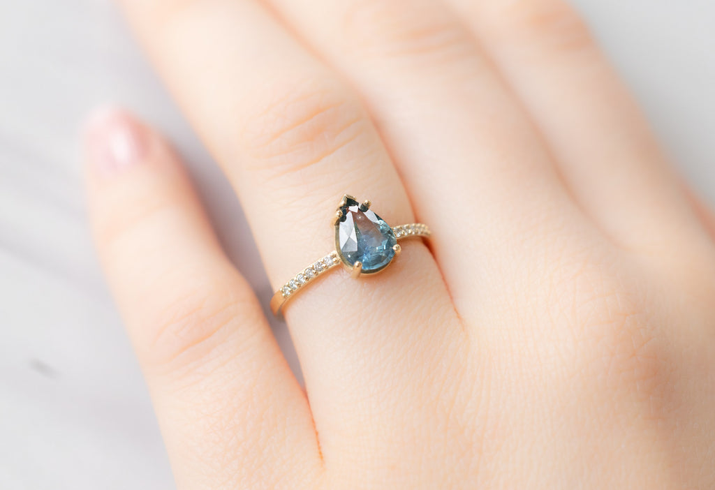The Willow Ring with a Pear-Cut Montana Sapphire on Model