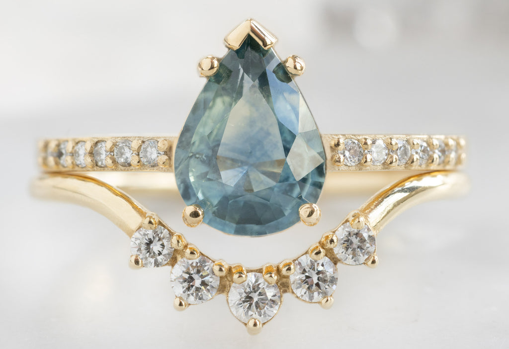 The Willow Ring with a Pear-Cut Montana Sapphire with Round Sunburst Stacking Band