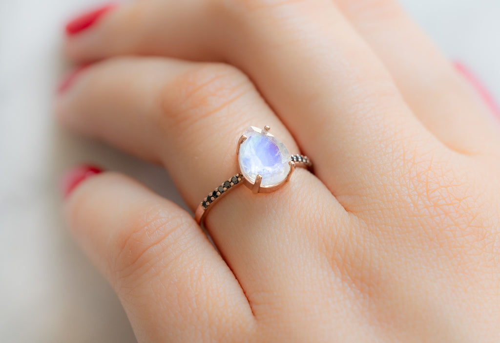 The Willow Ring with a Pear-Cut Moonstone on Model