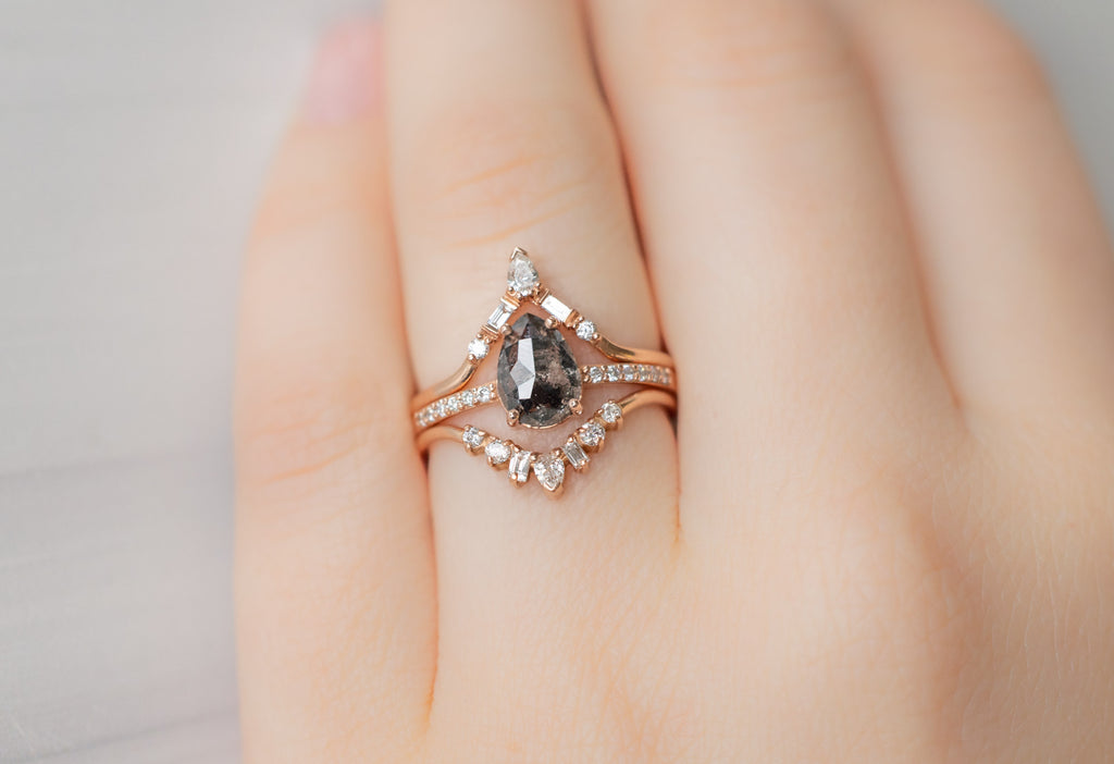 The Willow Ring with a Rose-Cut Black Diamond with White Diamond Stacking Bands on Model