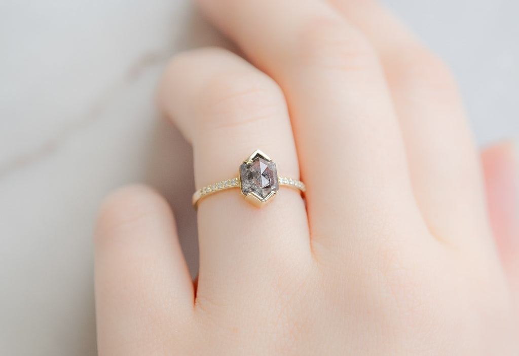 The Willow Ring with a Salt and Pepper Hexagon Diamond on Model