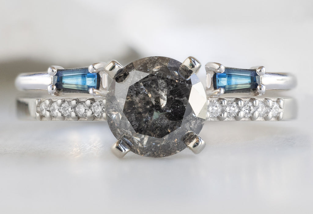 The Willow Ring with a Round Salt and Pepper Diamond with Open Cuff Montana Sapphire Baguette Stacking Band