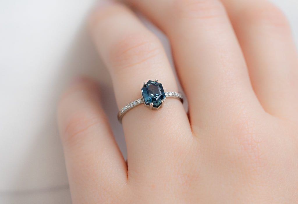 The Willow Ring with a Sapphire Hexagon on Model