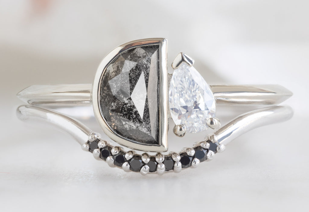 The You & Me Ring with a Black Half-Moon + Pear-Cut White Diamond with Black PAvé Diamond Arc Stacking Band
