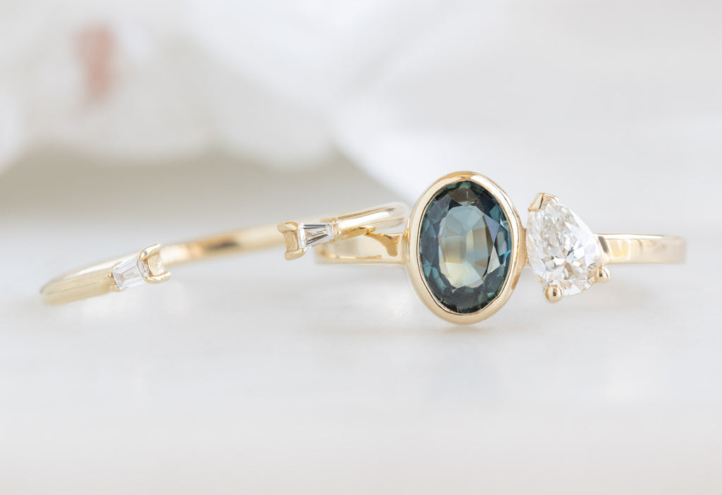 The You & Me Ring with a Blue Sapphire + White Diamond with Open Cuff Baguette Stacking Band