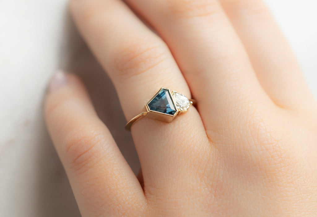 The You & Me Ring with a Geometric Sapphire + White Diamond on Model