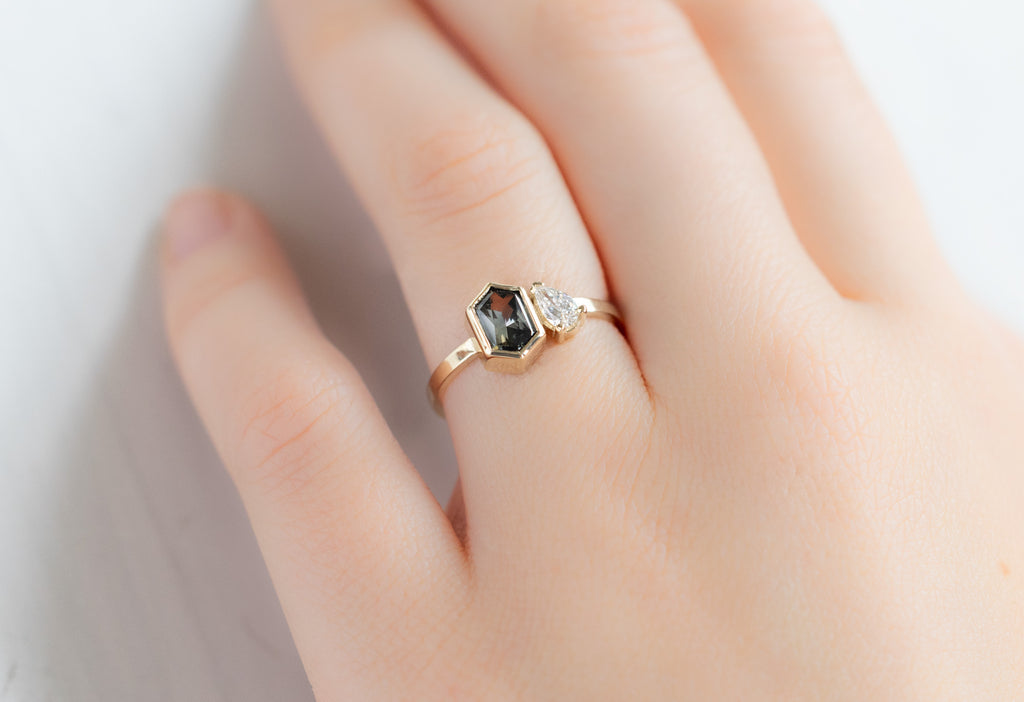 The You & Me Ring with a Sapphire + White Diamond on Model