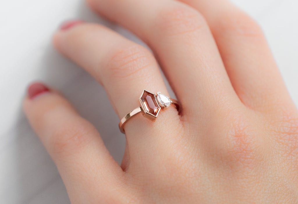 The You & Me Ring with a Sunstone + White Diamond on Model