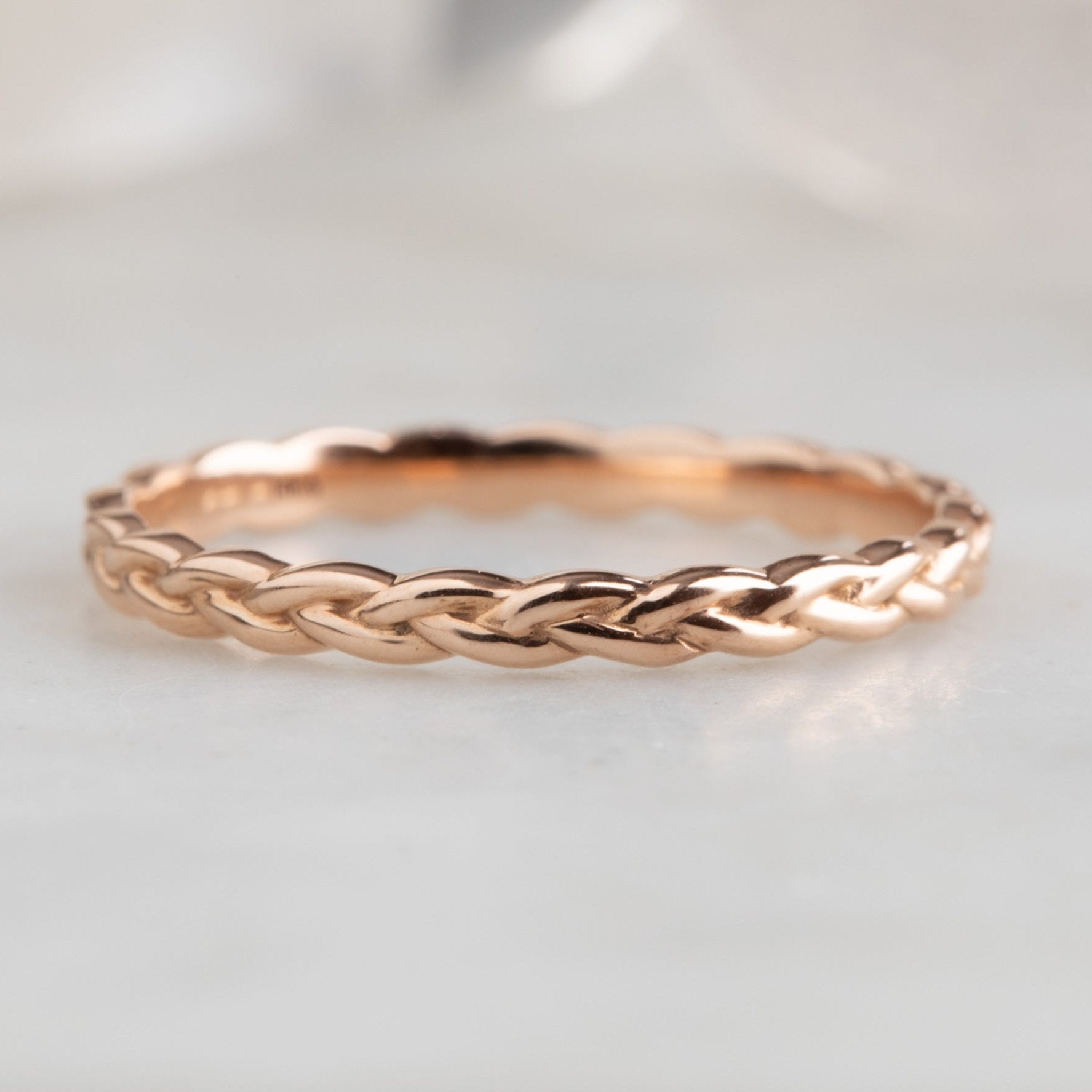 Rose gold braided wedding band discount
