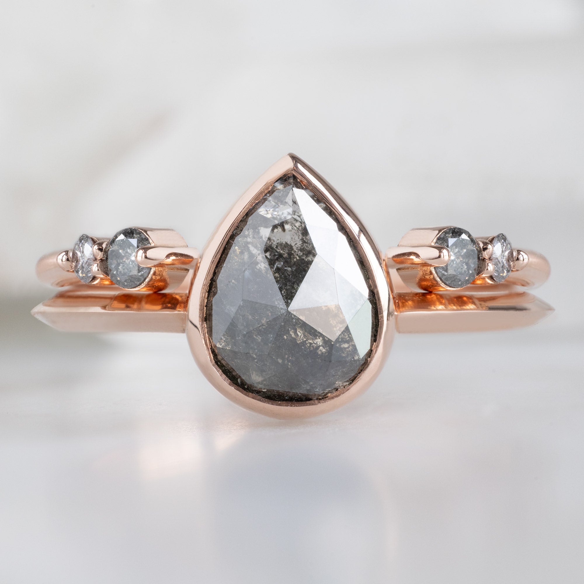 The Luxe Open Cuff Salt and Pepper Round Diamond Stacking Band in 14K Yellow Gold stacked with a diamond engagement ring